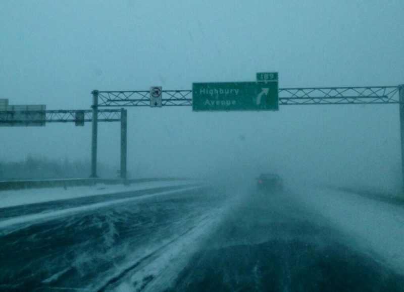 Blowing snow is seen on Highway 401 near London, Ont. on Monday, Feb. 24, 2014.