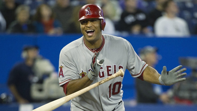 Los Angeles Angels centre fielder Vernon Wells laughs after hitting a pop fly out while playing against the Toronto Blue Jays during seventh inning AL baseball action in Toronto on Tuesday, Sept. 20, 2011.