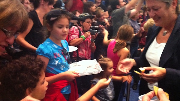 Children hand out snacks at city hall on Thursday Sept. 22, 2011. (Jean McDonald / Special to CTV Toronto)