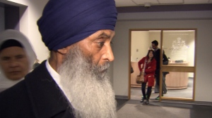 Gurmej Singh Gill leaves an Immigration and Refugee Board hearing in Vancouver, B.C. Feb. 26, 2014. (CTV)
