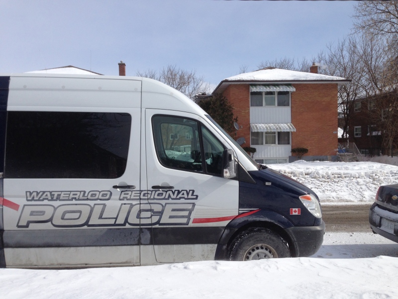 A Waterloo Regional Police vehicle sits outside a triplex on Lorne Avenue in Kitchener on Thursday, Feb. 27, 2014. (Brian Dunseith / CTV Kitchener)