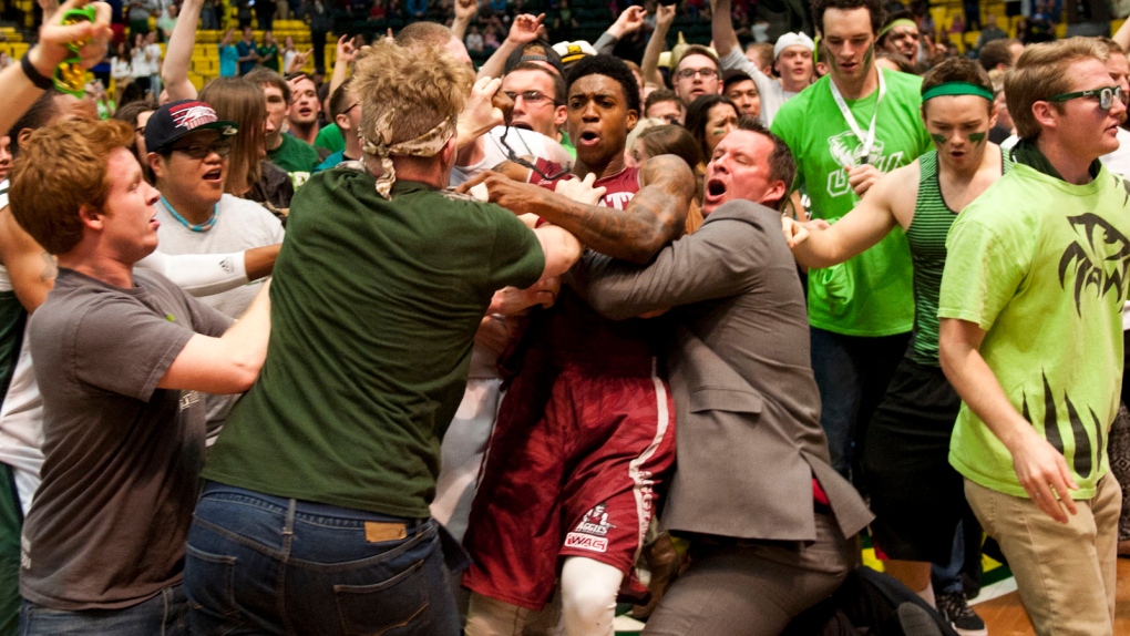 College basketball game ends in wild brawl