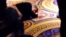In this unauthenticated photo, George Lopez appears to be passed out on a carpet on Thursday, Feb. 27, 2014. (@ChadMaura /  Twitter)