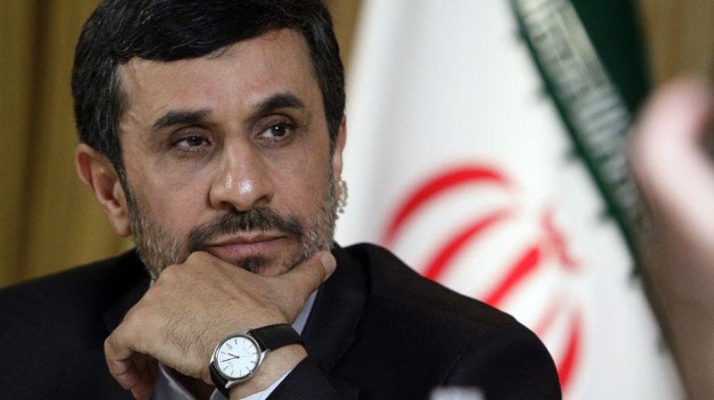 Mahmoud Ahmadinejad, President of the Islamic Republic of Iran, listens during an interview with editorial staff from the Associated Press on Thursday, Sept. 22, 2011 in New York. (AP Photo/Bebeto Matthews)
