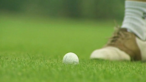 A golf ball is seen in fresh green grass at a golf course in China.