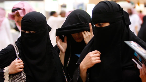 In this March 29, 2010 file photo, Saudi women visit the Saudi Travel and Tourism Investment Market (STTIM) fair in Riyadh, Saudi Arabia.  (AP / Hassan Ammar, File)