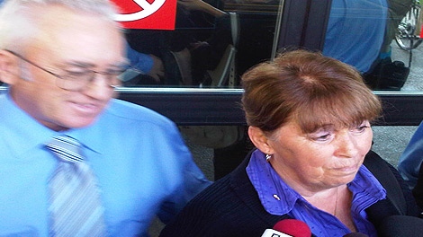 The parents of Ellie Meyer address reporters outside the law courts on Sept. 26, 2011.