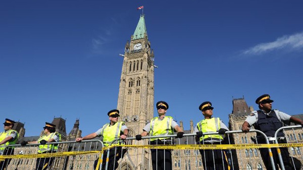 Hundreds of police patrol Parliament Hill before protest