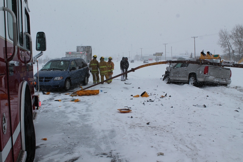 A traffic signal pole was struck down in a crash involving two vehicles Wednesday on the Trans-Canada Highway just east of Regina.