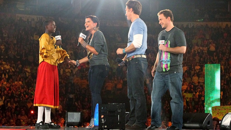 Grammy award winner, Nelly Furtado, alongside Free The Children co-founders Craig and Marc Kielburger, announces a $1 million donation to Free The Children in support of girls education in Africa, Tuesday, Sept. 27, 2011. (Free The Children)