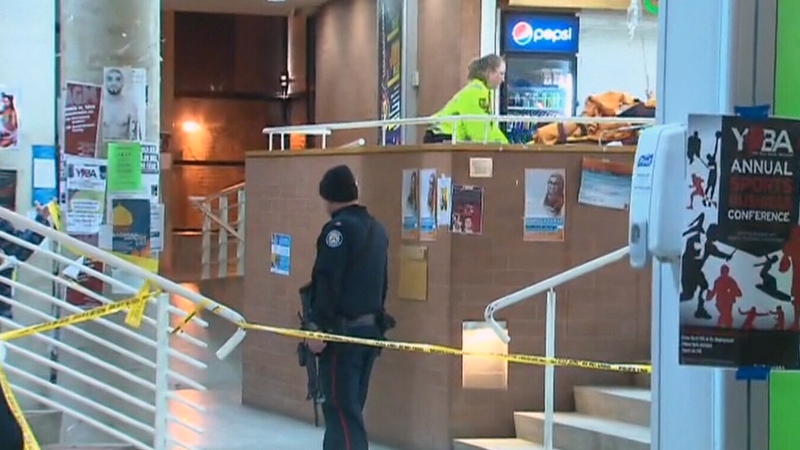 Toronto police investigate a shooting at York University on Thursday, March 6, 2014.