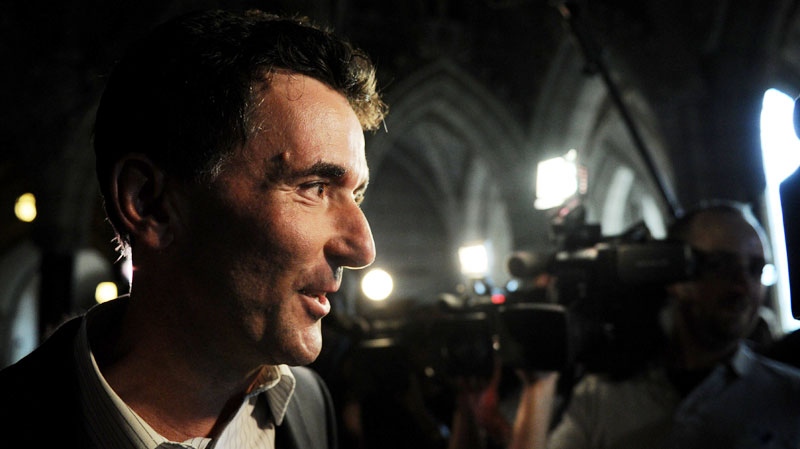 Paul Dewar leaves the New Democratic caucus meeting on Parliament Hill in Ottawa on Monday, Sept. 28, 2011. (Sean Kilpatrick / THE CANADIAN PRESS)