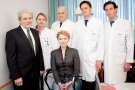 Former Ukrainian Prime Minister Yulia Tymoshenko poses with her doctors at the Charite Hospital in Berlin, Germany, on March 8, 2014. (Provided/Charite Universitaetsmedizin Berlin)