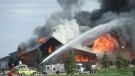 Fire crews battle a blaze at the Aspen Links COuntry Club in Emerald Park on Wednesday.