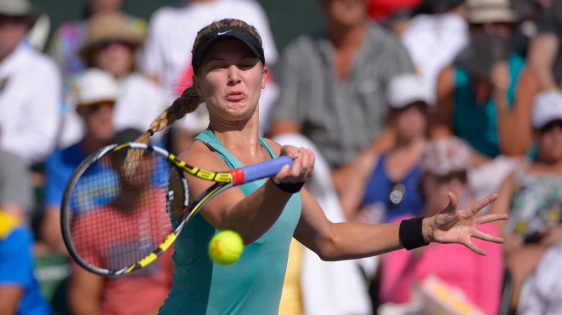 Eugenie Bouchard, of Canada, makes a return agains
