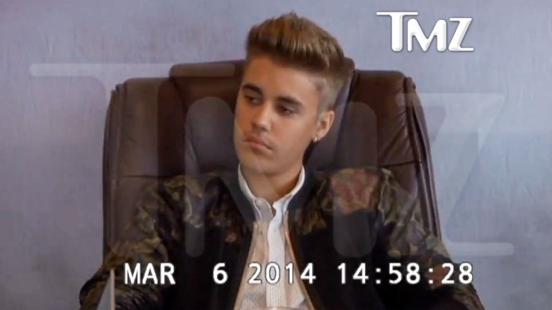 Justin Bieber listens as a lawyer criticizes his recent behaviour in this photo taken from video leaked online by TMZ.