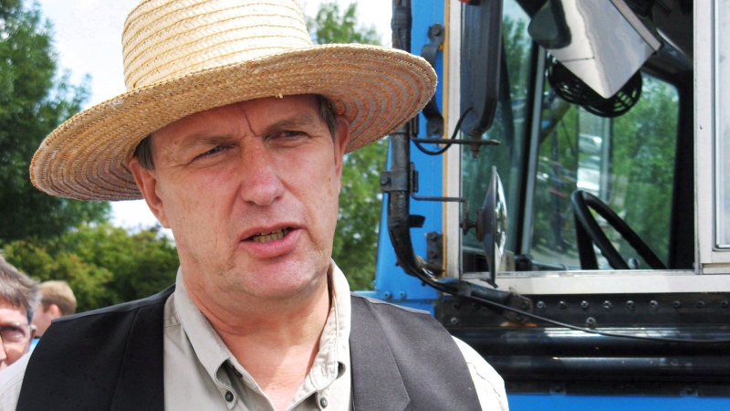 Farmer Michael Schmidt talks to reporters outside a courthouse in Newmarket, Ont., on Thursday July 31, 2008. (Colin Perkel / THE CANADIAN PRESS)