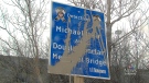 A memorial sign for two officers was vandalized near the Don Valley Parkway Bridge over Underpass Gate.