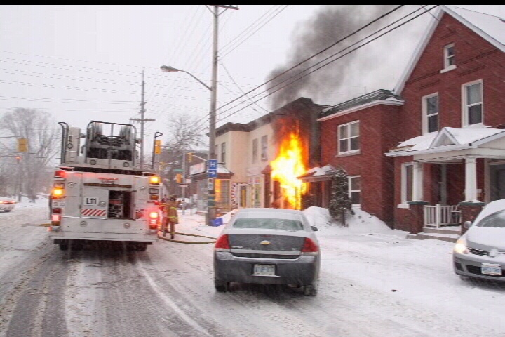 Firefighters battle a blaze on Gladstone Avenue in Ottawa