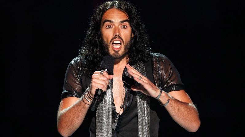 Russell Brand is seen on stage during a tribute for Amy Winehouse at the MTV Video Music Awards in Los Angeles on Sunday, Aug. 28, 2011. (AP / Matt Sayles)
