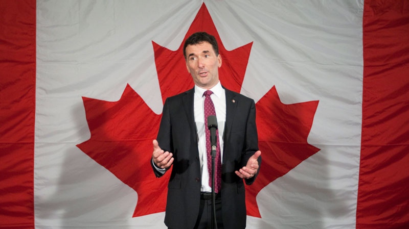 NDP MP Paul Dewar speaks with media after announcing he will seek the leadership of the party during an event in Ottawa, Sunday October 2, 2011. (Adrian Wyld  / THE CANADIAN PRESS)