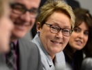 PQ leader Pauline Marois appears at a news conference during a campaign stop at a medical clinic in Laval, Que., Monday, March 17, 2014. (Ryan Remiorz / THE CANADIAN PRESS)