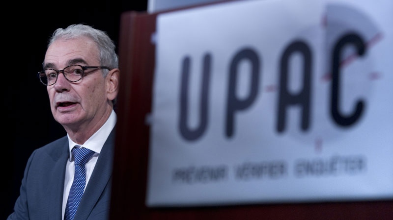 Quebec anti-corruption commissioner Robert Lafreniere delivers a statement during a news conference Monday, October 3, 2011 in Montreal.