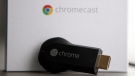 Google’s Chromecast, a small device that works wirelessly to stream video and music to a high-definition TV, is displayed on Wednesday, July 31, 2013, in Atlanta. The Chromecast is controlled by a smartphone or tablet computer and lets the user connect and view content from services like YouTube and Netflix via Wi-Fi. (AP / Jaime Henry-White)