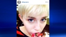 Singer Miley Cyrus shows off a lower lip tattoo in a photo posted on her Instagram.