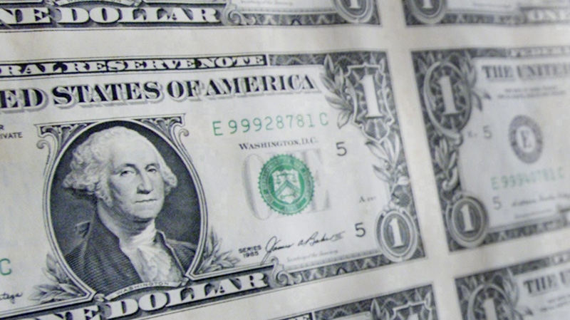 A sheet of American one dollar bills.