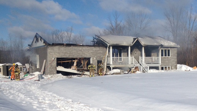 Emergency services respond to a fire on Gatineau's Chemin Des Erables on Friday, Mar. 21, 2014.