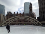 A man skates on the rink in Nathan Phillips Square on Friday, March 21, 2014. (Chris Kitching/CP24)