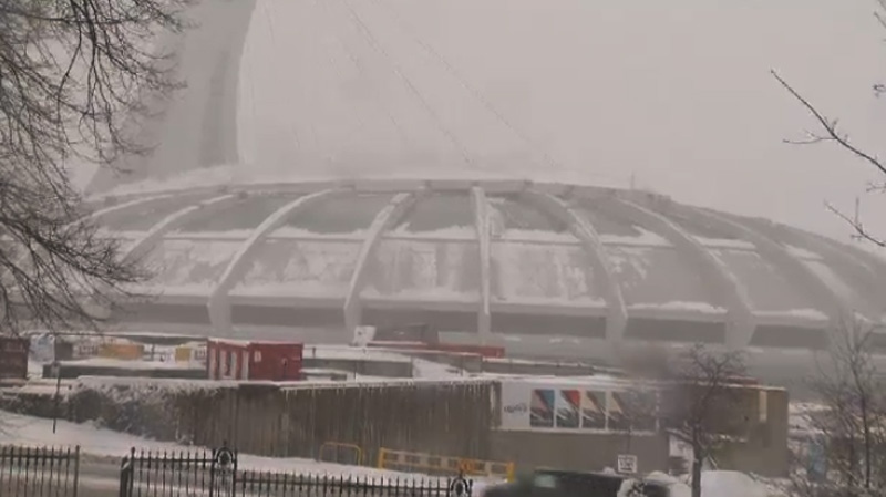 Snow on the roof of the Olympic Stadium has led to