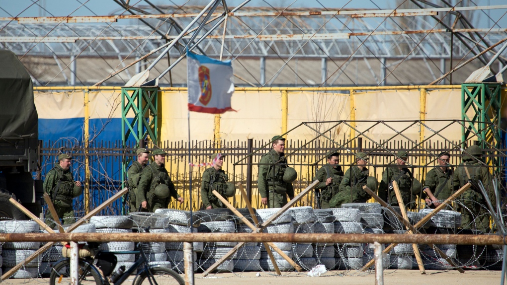 Ukraine commander held at stormed Crimea base