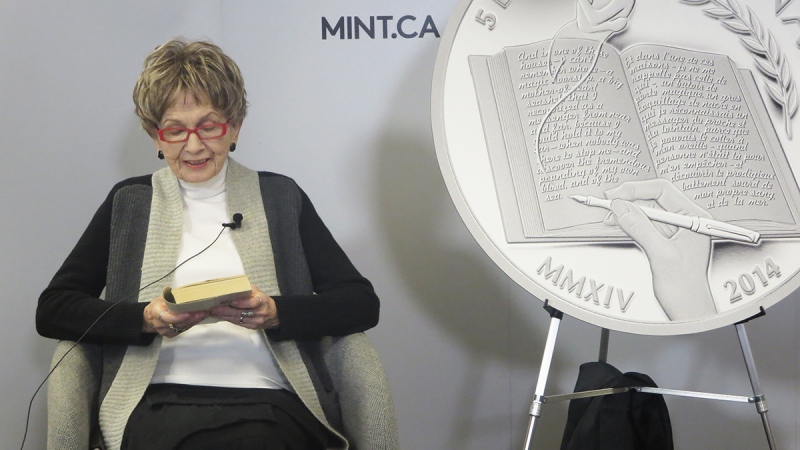 Nobel laureate Alice Munro reads from one of her short stories at the Greater Victoria Public Library at the unveiling of a silver coin in her honor by the Royal Canadian Mint, in Victoria, Monday, March 24, 2014. (Paul McNair / MyNews.CTVNews.ca)