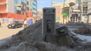 A snowbank on Portage Avenue in downtown Winnipeg is shown on Portage Avenue on March 24, 2014.