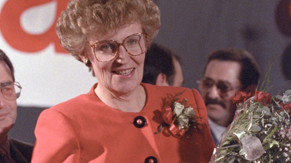 Catherine Callbeck clutches a bouquet of flowers after winning the leadership of PEI's Liberal Party in Charlottetown on Jan 23, 1993. (Andrew Vaughan / The Canadian Press Images)