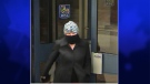 A fraud suspect can be seen in this undated photo released by Windsor police.