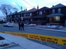 Police tape is seen on Symington Avenue following a fatal shooting on Tuesday, March 25, 2014. (CP24/Kyle Surowicz)