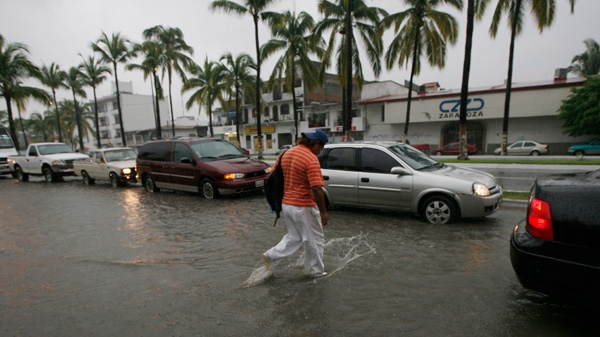 Hurricane Jova threatens Mexico's resorts, ports