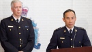 RCMP Insp. Henry Tso (right) and Supt. Dave Bellamy talk to media at a news conference in Toronto on Wednesday, March 26, 2014. (Chris Young / THE CANADIAN PRESS)