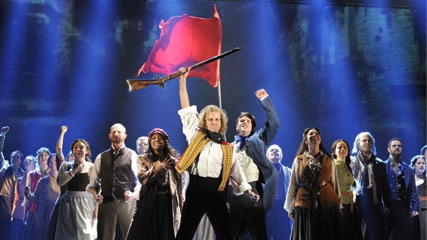An undated photo provided by the Center Theatre Group shows the cast of Cameron Mackintosh�s new 25th anniversary production of Alain Boublil and Claude-Michel Sch�nberg�s �Les Mis�rables.� (AP Photo/Center Theatre Group, Deen van Meer)