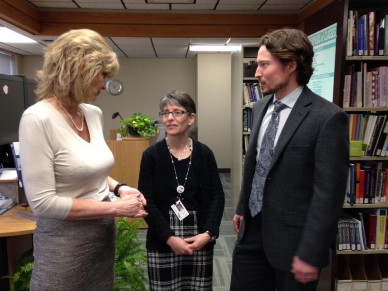 CTV's Jan Sims, left, speaks with outgoing associate medical officer of health Dr. Bryna Warshawsky, centre, and Dr. Christopher Mackie, medical officer of health and CEO with the Middlesex-London Health Unit on Thursday, March 27, 2014. (Chuck Dickson / CTV London)