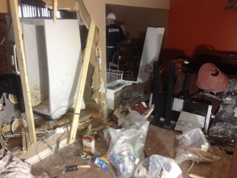 The inside of a Barrie Street home, in Chatham, Ont. can be seen, after an SUV struck the building, Thursday, March 27, 2014. (Chris Campbell/ CTV Windosr)