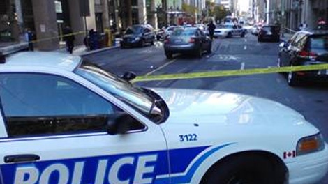 Paramedics said a female cyclist in her thirties was struck and killed by a car on Queen Street Tuesday, Oct. 11, 2011.