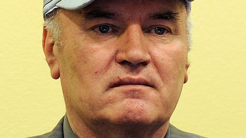 Former Bosnian Serb Gen. Ratko Mladic sits in the court room during his initial appearance at the UN's Yugoslav war crimes tribunal in The Hague, Netherlands, Friday, June 3, 2011. (AP / Martin Meissner)