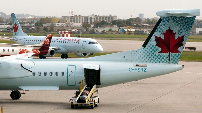 Air Canada planes land at Pierre Elliott Trudeau Airport