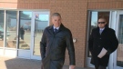 Luke St. Onge walks out of Saskatoon provincial court March 28, 2014 after being found not guilty of assault.