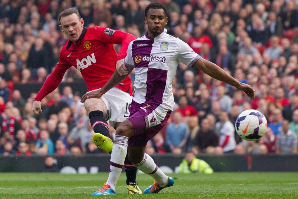 Man U's Wayne Rooney scores against Aston Villa