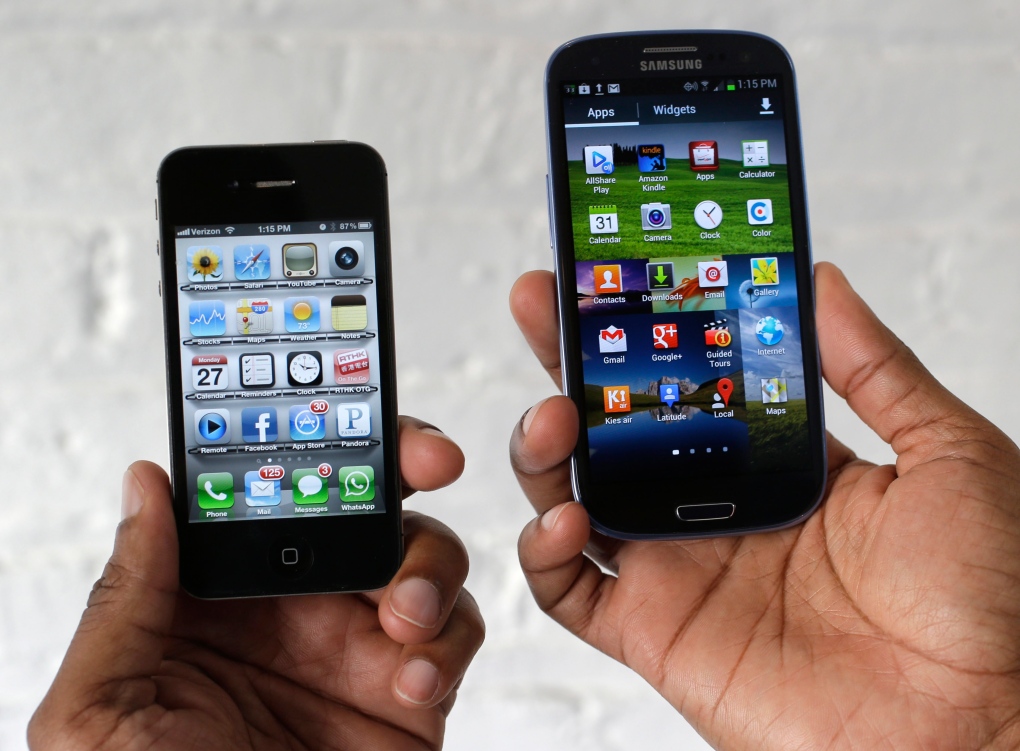 Apple iPhone displayed next to Samsung Galaxy